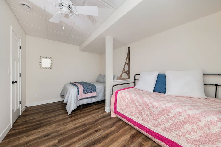 The guest bedroom offers a full size bed with a new heating blanket for cooler nights and a twin daybed with a handmade quilt. The walk in closet provides ample room for clothing, additional linens, blankets and extra storage for suit cases.
