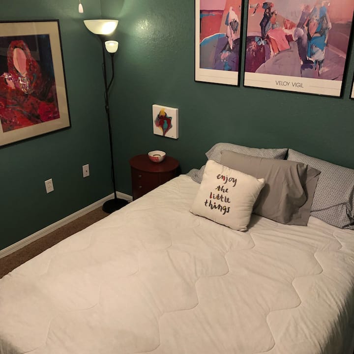 Bedroom with queen bed.