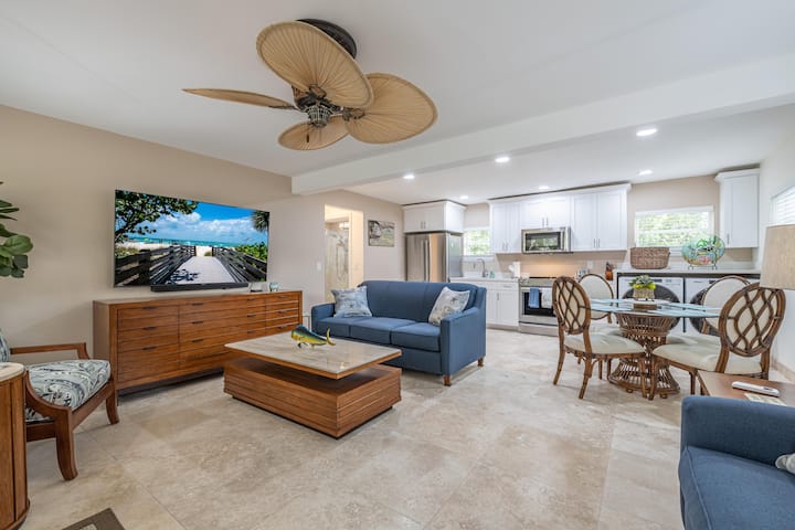 Inviting living room space, where comfort meets style. Unwind on upgraded queen bed sofa sleepers, enjoy a large screen TV, and experience the perfect blend of relaxation and modern elegance.