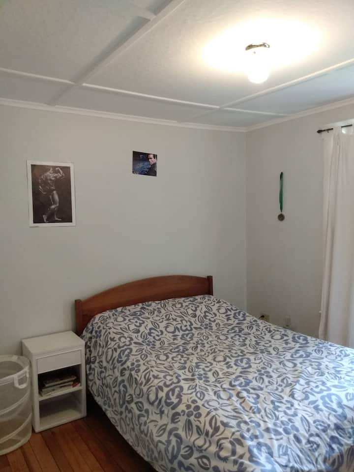 Second upstairs bedroom with a double bed.