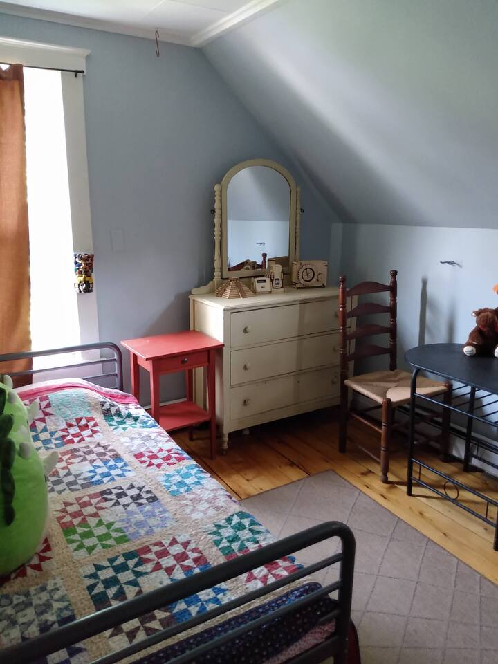 Third upstairs bedroom has a single bed.