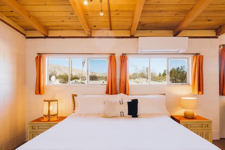 The Copper Room (Bedroom 1) with Ensuite Bathroom, Kind Sized Tempur-Pedic Mattress, Original Mid-Century Furnishings, and Adjoining Living Space