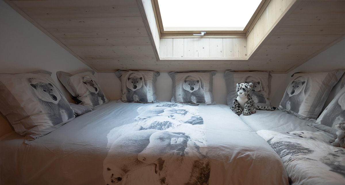 The bear's dorm is the children's corner.
It comes with a TV.