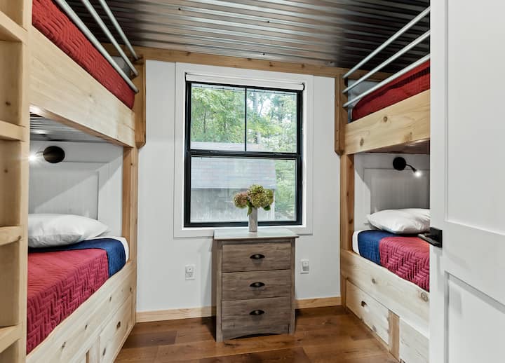 Kids will love the sleepover feel of the bunk room, which includes four twin beds.