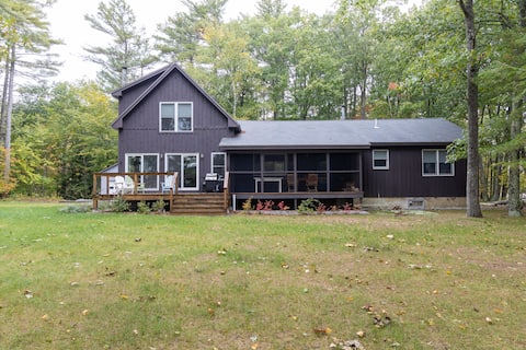 Lake house on walking trail near mountain