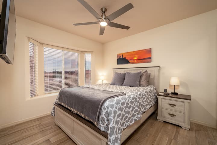 Bedroom 2, Queen Bed with Flat Screen TV & Walk-in Closet.