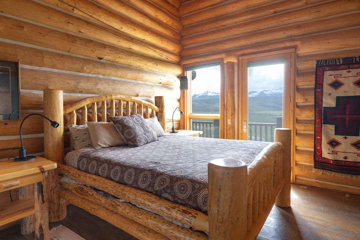 Master bedroom w/king-sized log bed on main level 