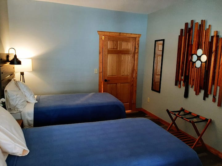 Twin beds occupy this space perfect for the younger or single people in your group.