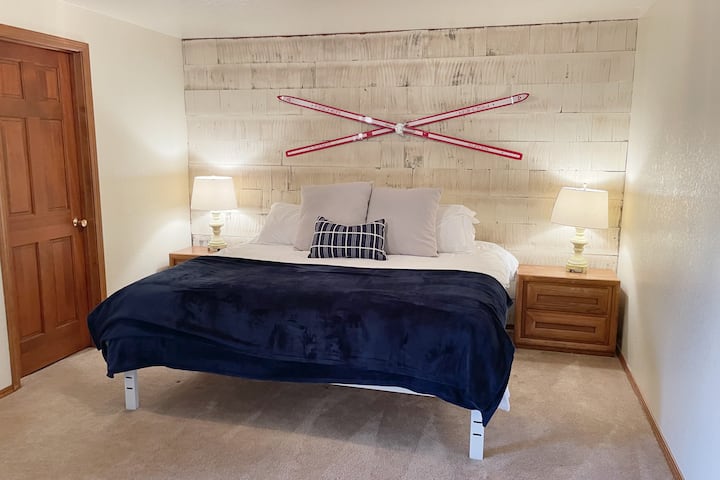 Unwind in the upstairs bedroom with a king size bed and a twin bed in the oversized closet.