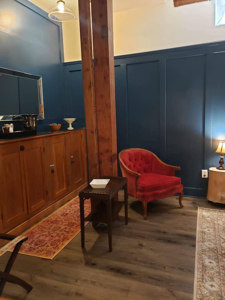 Built in cabinets along the back wall are the perfect spot to store your clothes. A comfy chair is great for reading. The large, high end king size bed will have you deeply sleeping.