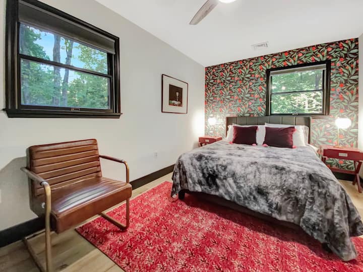The 'red' bedroom features a queen-sized bed, and super soft bedding makes every night a dream.