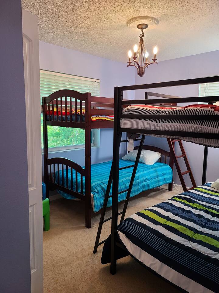 Bed Room 3 with 2 sets of Bunk Beds. The Wood Bunk beds for children only. The metal set can hold full grown adults if needed. 