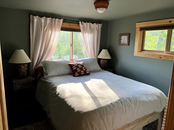 Bedroom #1. Queen bed & a small closet. Some additional storage space under the bed.