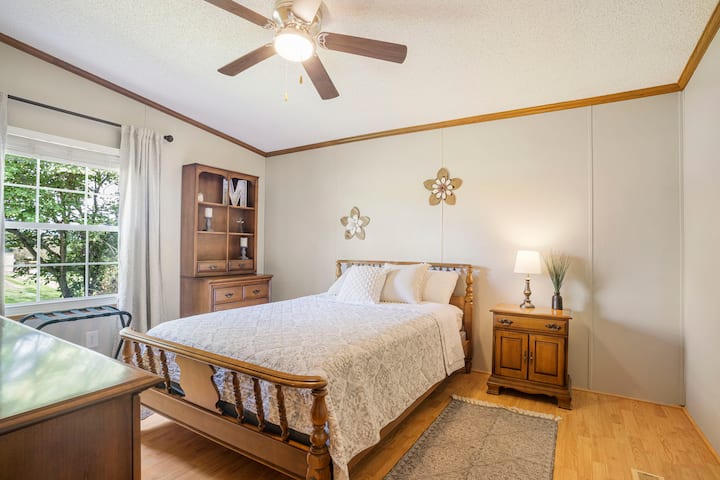 This is a "full" bed with room for an optional air mattress. We have an air mattress in stock for you to borrow. All bedrooms have a large closet space as well.