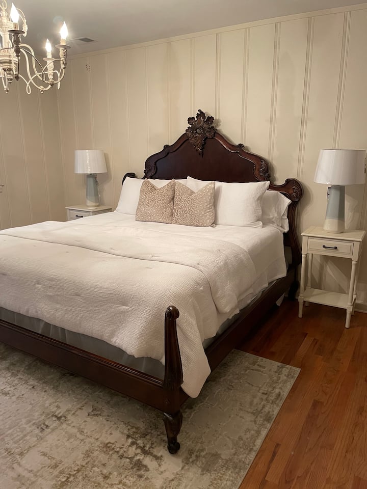 The Master bedroom offers a King bed, comfortable linens, a chest of drawers,  a 60” TV, large closet, and an extra pillow and king blanket located in the closet!