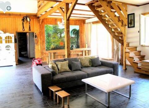 Stylish horse barn with fireplace and sauna
