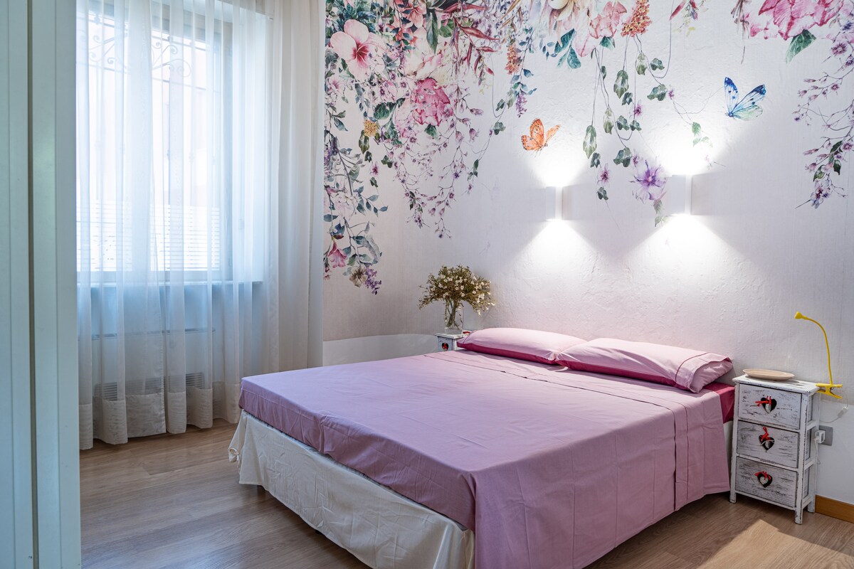 slaapkamer met tweepersoonsbed of twee eenpersoonsbedden