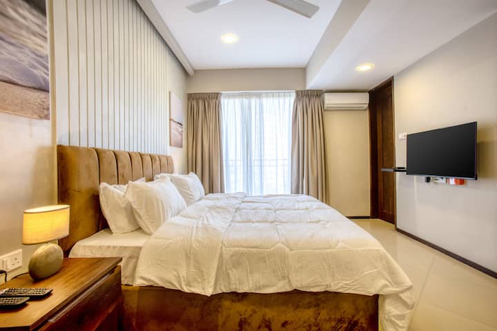 Bedroom 1, with private bathroom, equipped with smart tv, AC, Fan, walk in closet and balcony