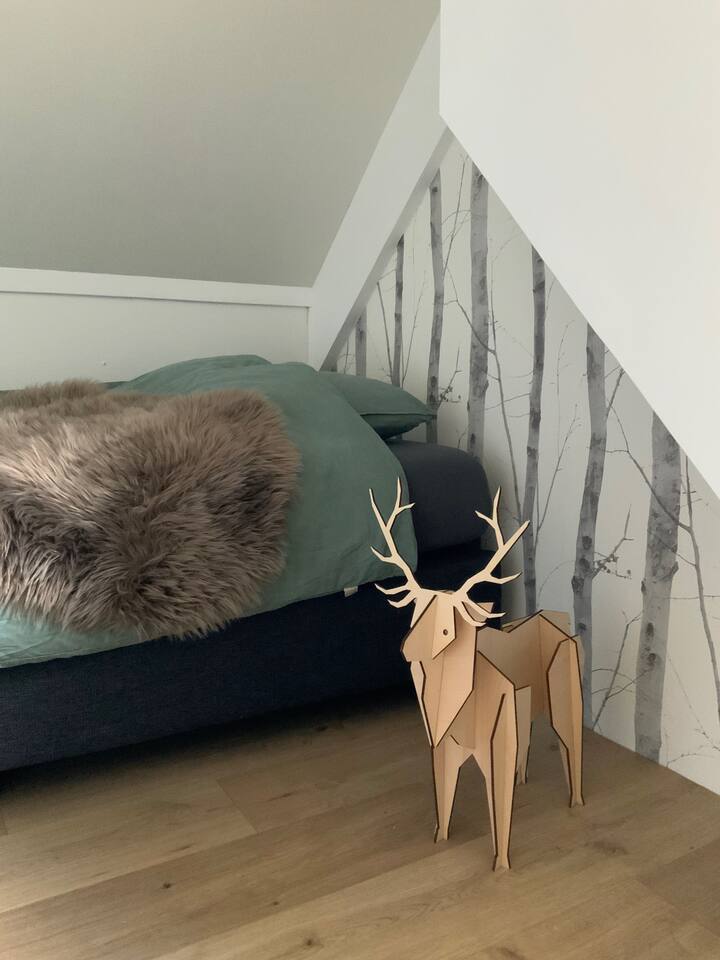 Slaapkamer 2, met twee 1-persoons boxsprings van 90x210