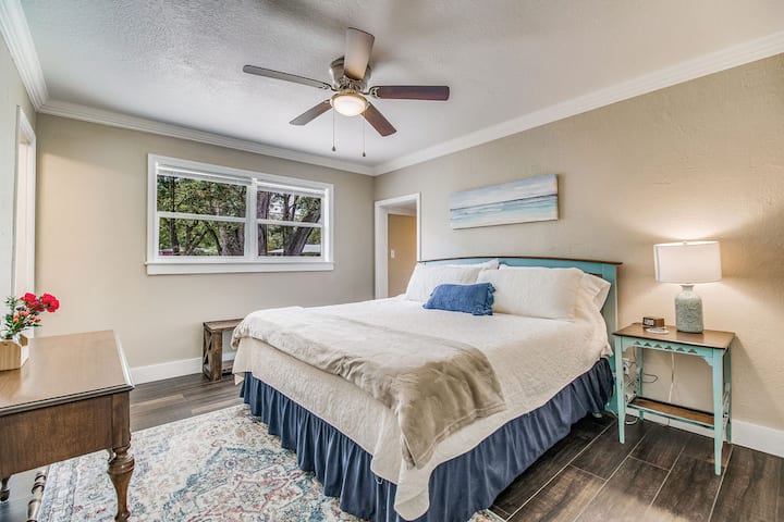 Master bedroom features a King bed with Tempurpedic mattress, en suite bathroom and adjoining bonus room with sofa bed and TV. 