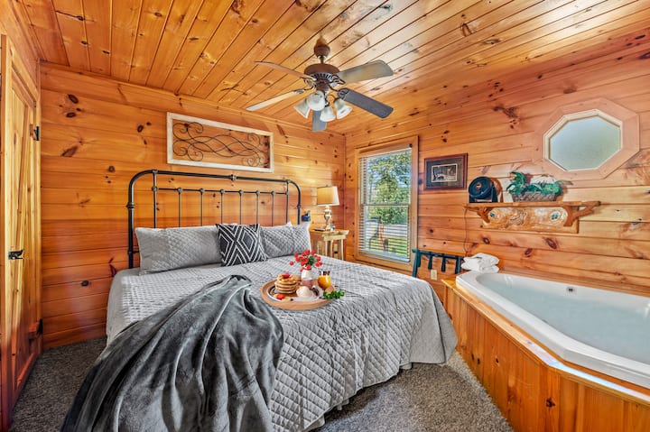 Master bedroom with king bed and jacuzzi