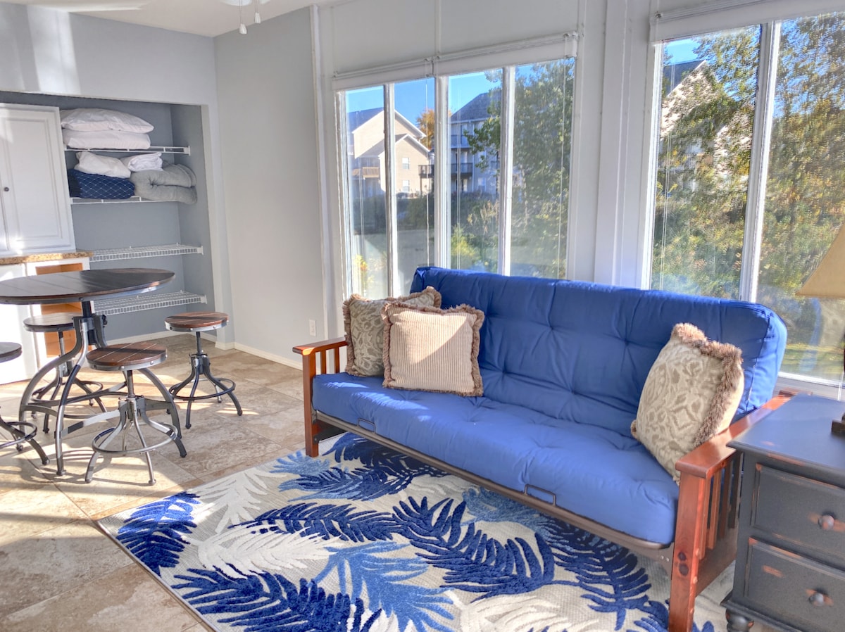 Our sunroom is temperature-controlled for use during all seasons. The futon is available to sleep 2 and quality new linens are provided. 