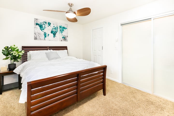 Master bedroom with in-suite bathroom.