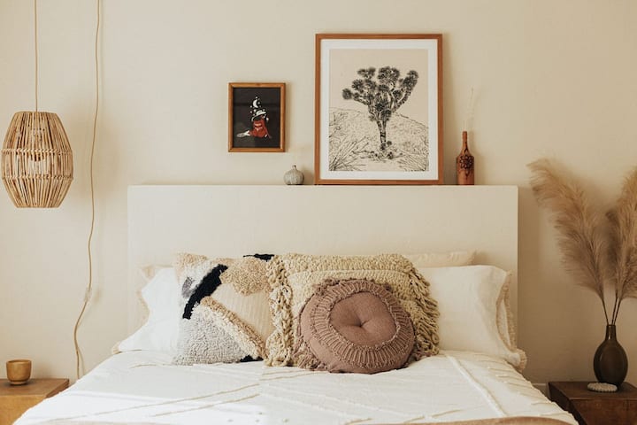 Queen size bed and beautifully-designed interior.