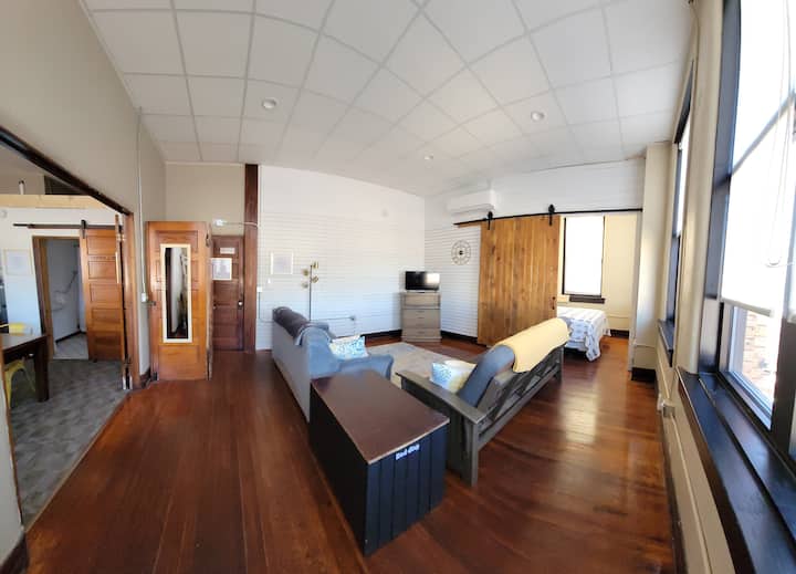 open living space with 2 sleepers to accommodate 4 guests along with a small changing area in the back corner to help accommodate multiple guests. 