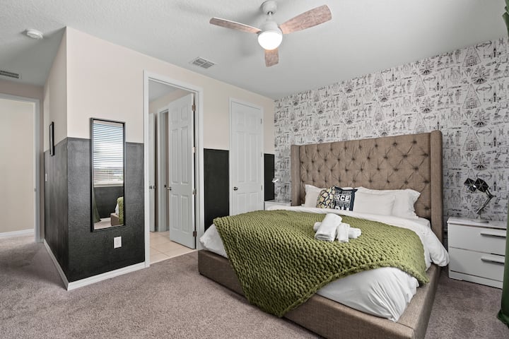 This is a king bedroom upstairs with a shared bathroom to the kids bunk room.