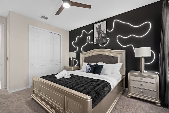 This king bedroom is downstairs and has a bathroom right next to it.