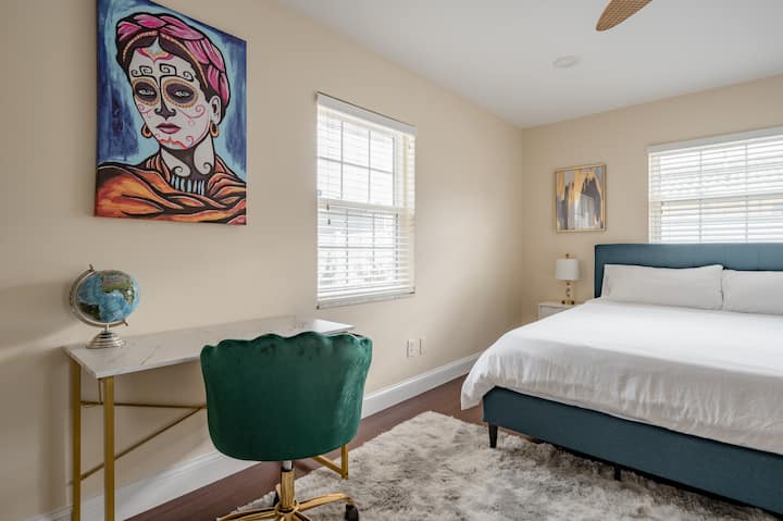 Bedroom 1: Unwind in luxury with a California King bed, private full bathroom, and a smart TV for your entertainment.