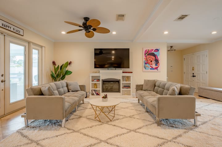 Relax and unwind in our spacious living room, where comfort and entertainment come together seamlessly. This inviting space features two sofa beds that easily transform into twin beds, providing flexible sleeping arrangements for your group.