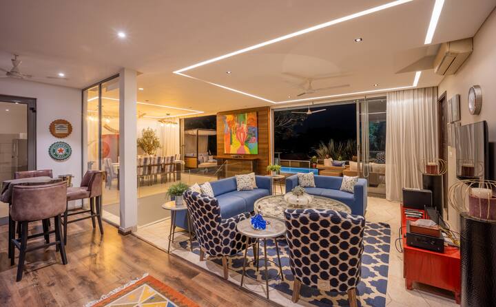 A Symphony of Luxury & Warmth ✨
Where contemporary elegance meets cozy comfort. This space sets the perfect scene for a night of fine dining and poolside convos.