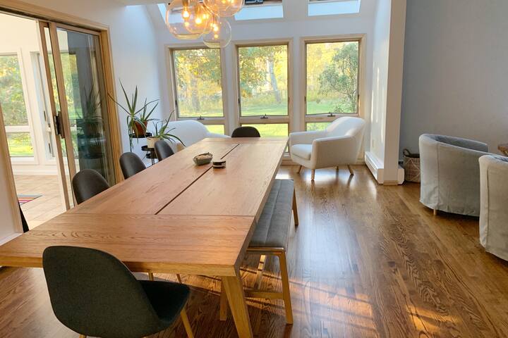 Sun-drenched, open layout with tranquil koi pond gallery image 3