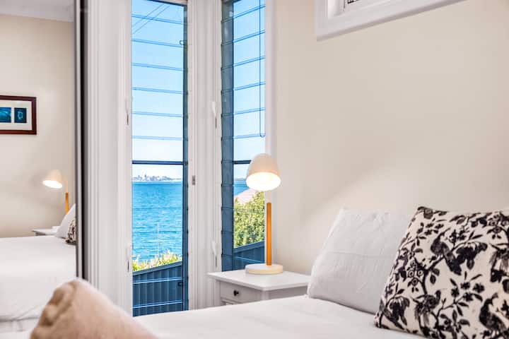 Master bedroom with lake views, ensuite and king size bed