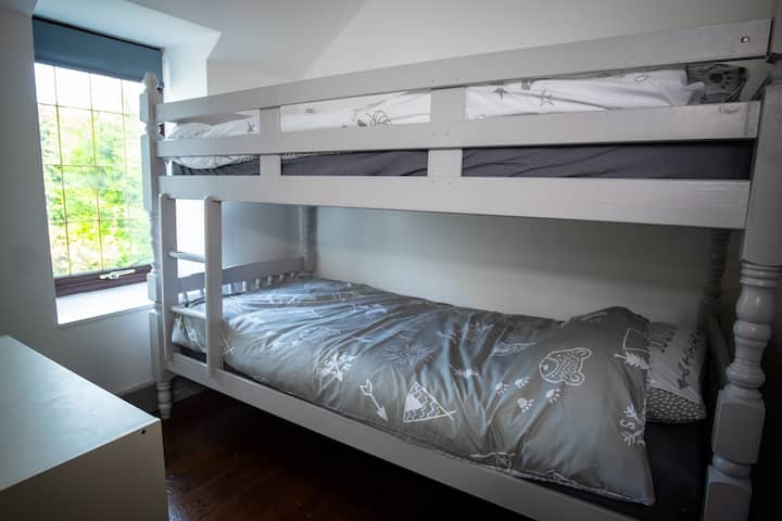 Small bedroom with bunk beds.