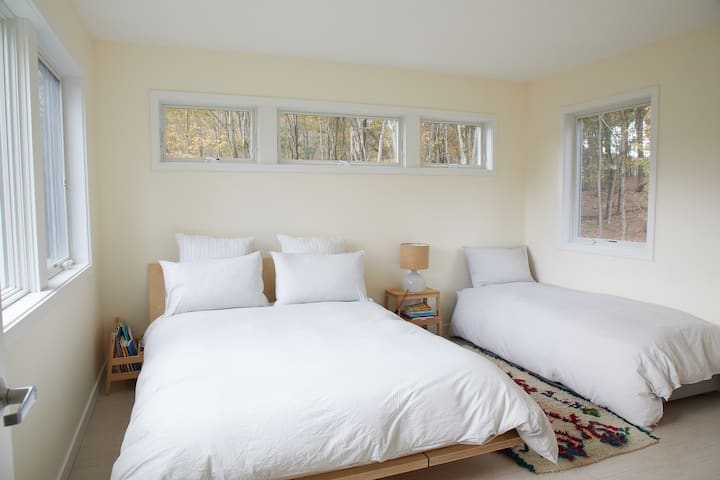 Upstairs bedroom #3 with queen bed and twin bed.