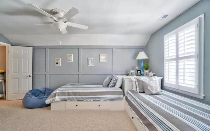 The ultimate sleepover spot! This room features two twin beds, each with a hidden trundle underneath—perfect for sleeping up to four. It’s the ideal 'kids' headquarters for siblings or cousins to share.