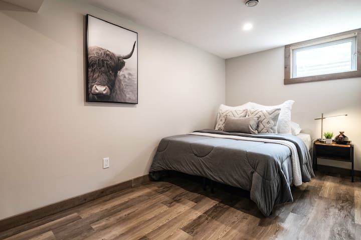 Chambre au rez-de-chaussée deux queens 