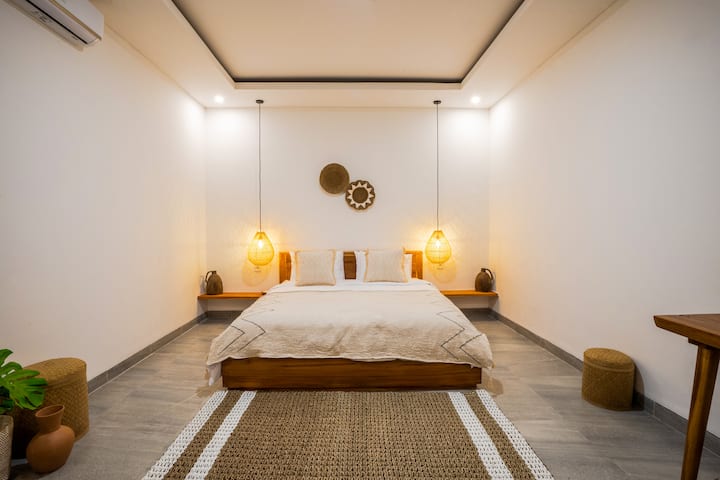 Bedroom 2. With cute tone-down decor