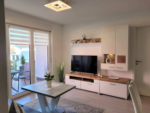 New apartment, 2 bedrooms., top out., TG f. car