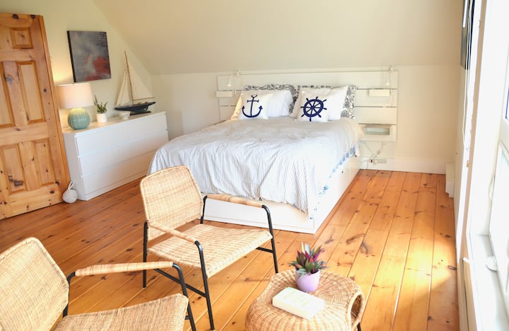 Enjoy a great night's sleep listening to the waves in the primary bedroom. The room features a queen bed with ample storage, a dresser and armoire. 

