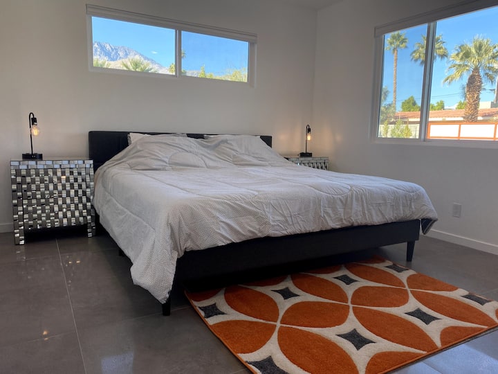 Bedroom 1 - simple, elegant luxury, with beautiful Palm Springs views from both windows. Ensuite bathroom, separate dressing/make up/office area. All bedrooms have central air con/heating, bedside tables, with bedside lamps and mains and US power.