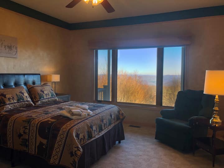 Bedroom with queen bed and attached to jack and jill bathroom.