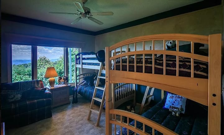 Downstairs bedroom with 2 sets of  bunkbeds (4 twin size beds).  This bedroom is attached to jack and jill full bathroom.