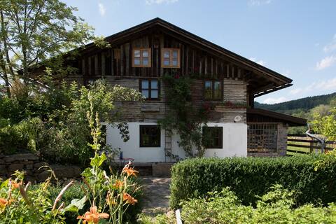 Small farmhouse at the Bayer National Park. Forest