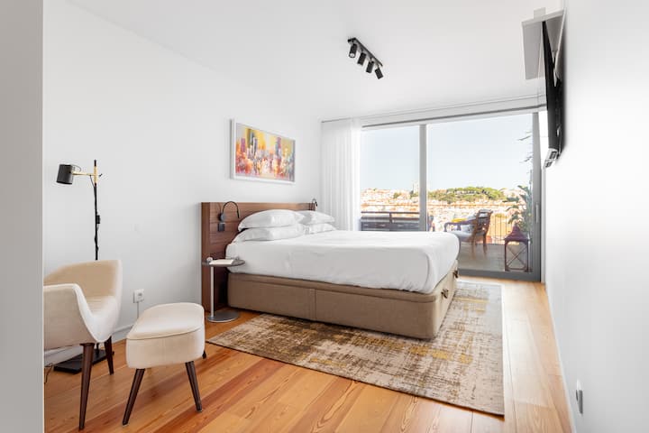 Bedroom 1 | Luxury bedroom with plenty of natural light and private bathroom