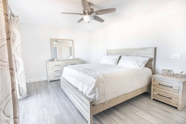 Second floor master bedroom suite with full bathroom and second floor deck access