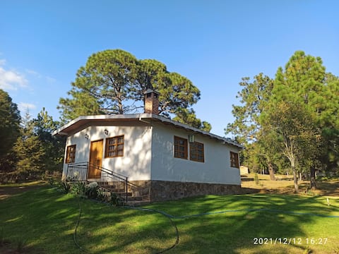 Negrete Cabin. House in the woods with fireplace.